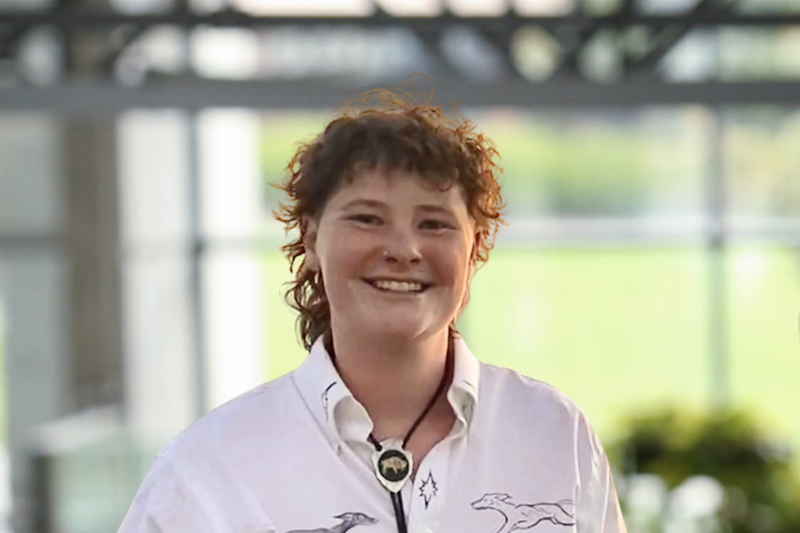 photo of Megan Westcott in front of industrial background.